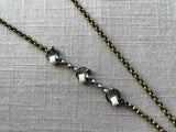 closeup of antler lariat with mixed metal chain mix