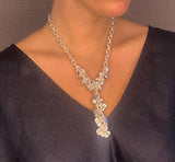 model wearing organic-shaped silver necklace