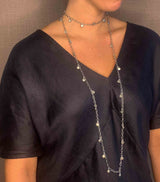 model wearing organic-shaped silver necklace