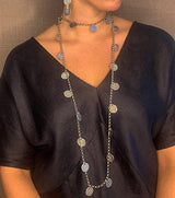 model wearing organic-shaped silver necklace