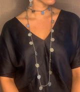 model wearing organic-shaped silver necklace