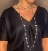 model wearing organic-shaped silver necklace
