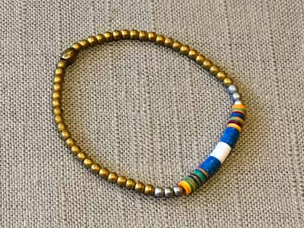 heishi bead bracelet comprising vinyl discs in a blue and white racing stripe and metallic beads