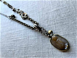 top view of antique carved Owl of Athena cameo pendant on chain mix